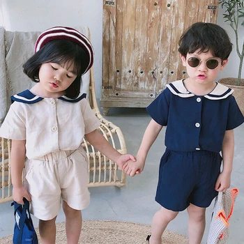 2020 Letní korejský Styl Děti Námořník Límec Bavlněné Povlečení Sady Oblečení Roztomilé Chlapci Dívky Krátký Rukáv T Tričko + Šortky 2ks Vyhovuje